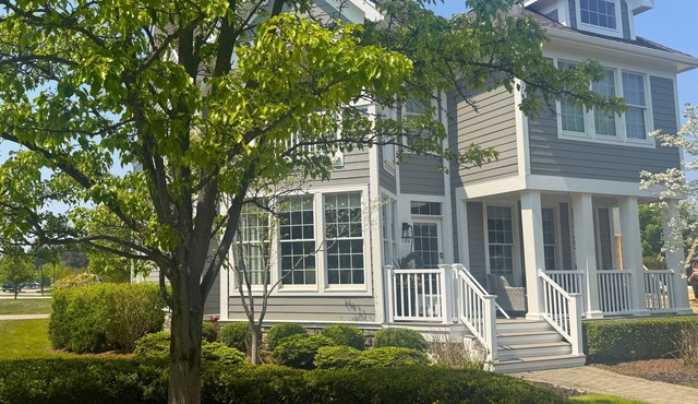 Barefoot Luxury 24: A spacious 4-bedroom retreat in scenic Bay Harbor, MI.