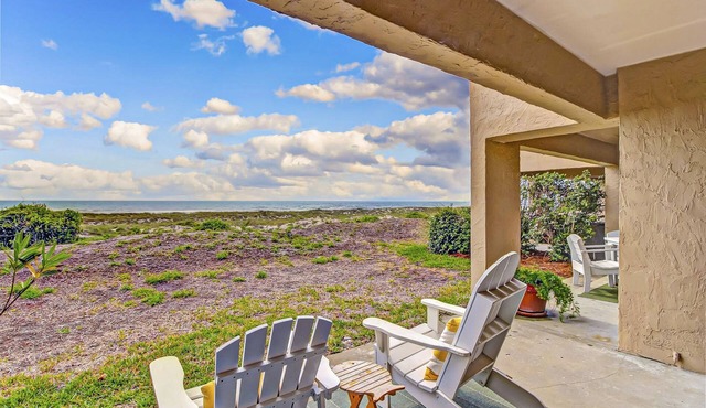 Beachfront condo with outdoor pool, patio & washer/dryer - dog-friendly