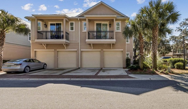 Beautifully designed townhouse nestled in the wooded charm of Amelia Island