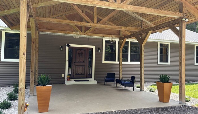 Countryside Escape, 4 bedrooms and 2 baths, sits on the 10 acres.