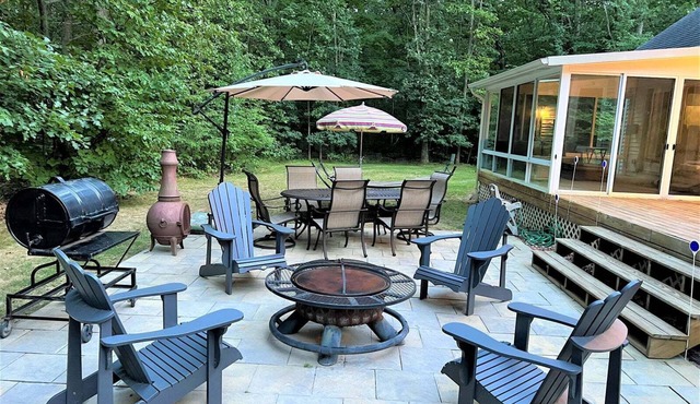 Experience luxury at Riverwalk, a 4-bedroom retreat in serene Saugatuck, MI.
