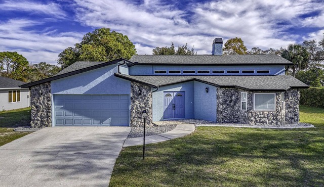 Four Beds, three baths, heated pool, and a Golf Course. What more do you need!