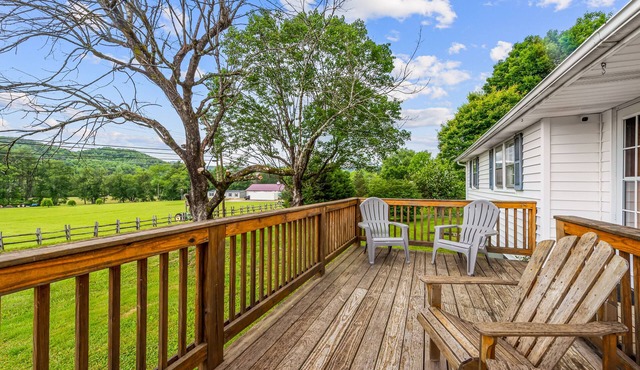 Inviting home with game room, firepit, full kitchen, central AC, & W/D