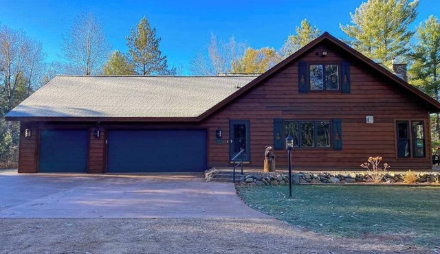 Lakefront home with game rooms, dock, kayaks, private beach, fireplace, firepit
