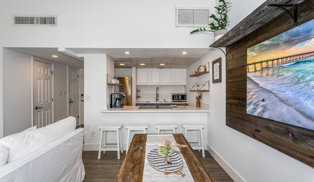 New! Centrally located 1 bed 1.5 bath with water views!