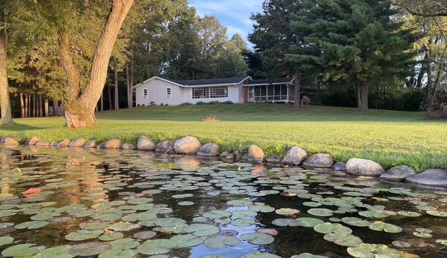 Private, newly renovated lakefront cottage on 10+ acres of land.