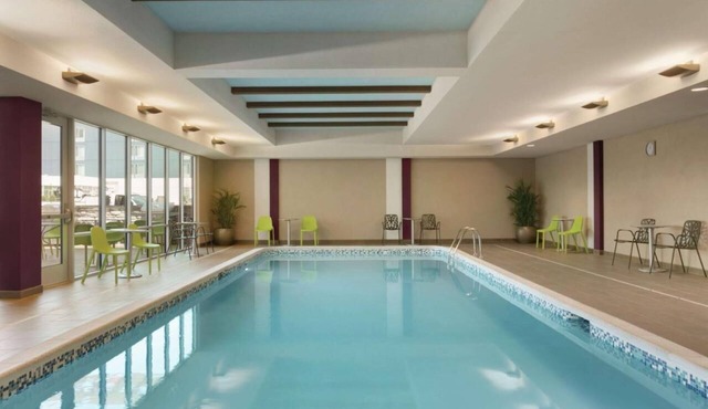 Rare Find! 2 Convenient Units! Kitchen, Pool, Free Breakfast and Parking!