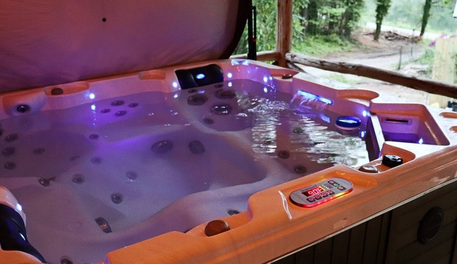 REST ASSURED WITH HOT TUB AND COMFORT OF THIS HOME!
