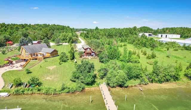 Riverfront Cheboygan Home w/Dock ~ 4 Mi to Town!