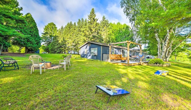 Riverfront Home w/Dock ~ 6 Mi to Cheboygan!