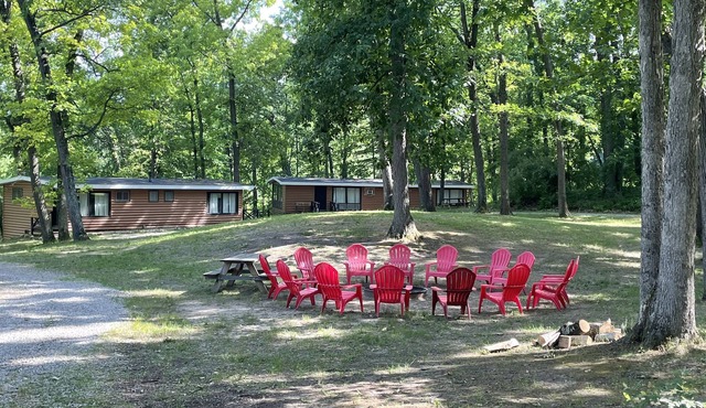 Rustic cabins in secluded campground with lake access and woods to wander in.