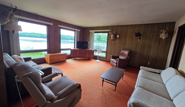 Sandy Lake Retreat Charming 2-bedroom cabin with WiFi, AC steps from the lake!