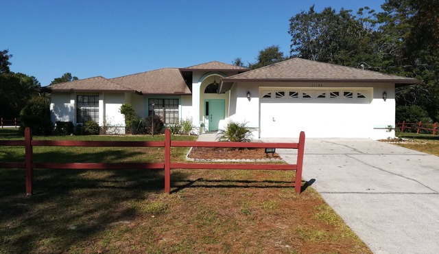 Spacious and comfortable home with heated pool . in Spring Hill