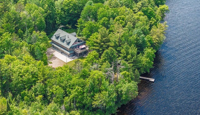 Spacious Lakefront Retreat with Dock & Canoes in Tomahawk
