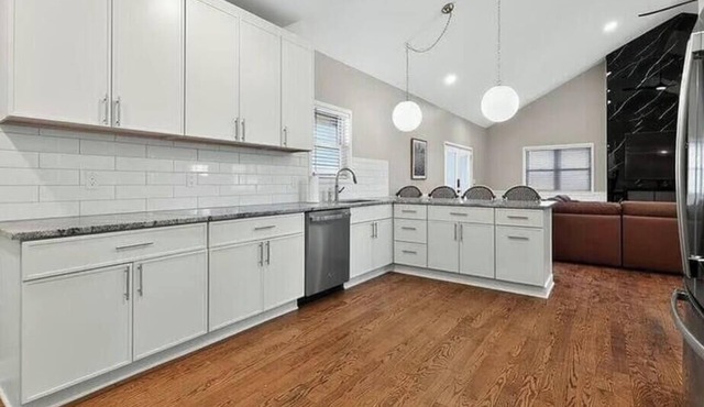 Spacious Riverfront Retreat With Wraparound Porch And Room For The Whole Team in South Lyon