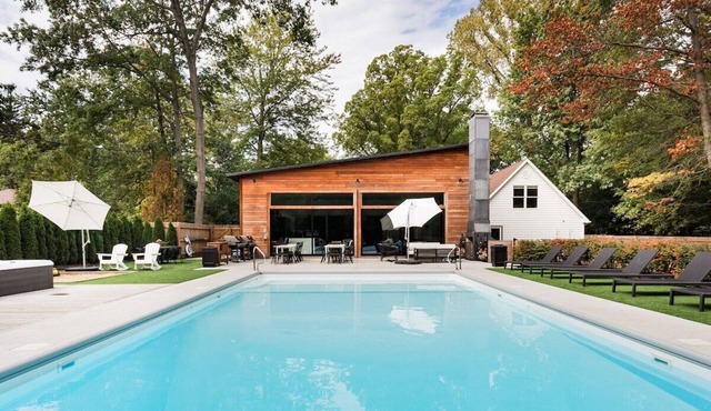 Sprawling Modern Home with Chef's Kitchen, Pool & Hot Tubs - walk to the beach!
