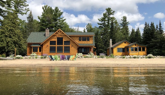 Stunning Log Home Plus Guest Cottage With Sandy Beach!