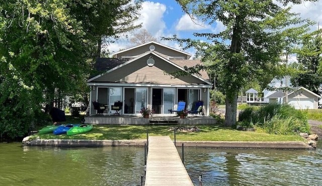 This charming lake cottage located in a peaceful, safe community right on the lake!