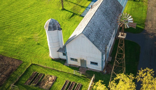 Unity Farm: Three private cottages set across restored prairie and forest along the St. Croix River, with a barn and tennis courts. in Shafer