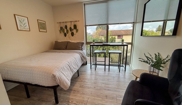Urban studio unit with patio views, shared lounge space and dedicated workspace
