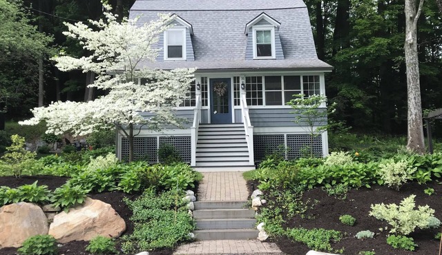 Walk into town, soak up sun on enclosed porch & steps away from nature trails!