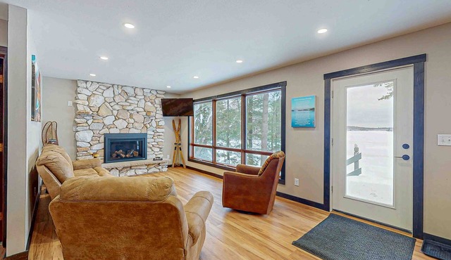 Waterfront home in great location with private dock, firepit & deck