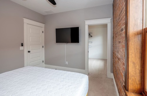 Central Business District Apartment | Downtown Luxury Loft, 13-Ft Ceilings, Walkable
